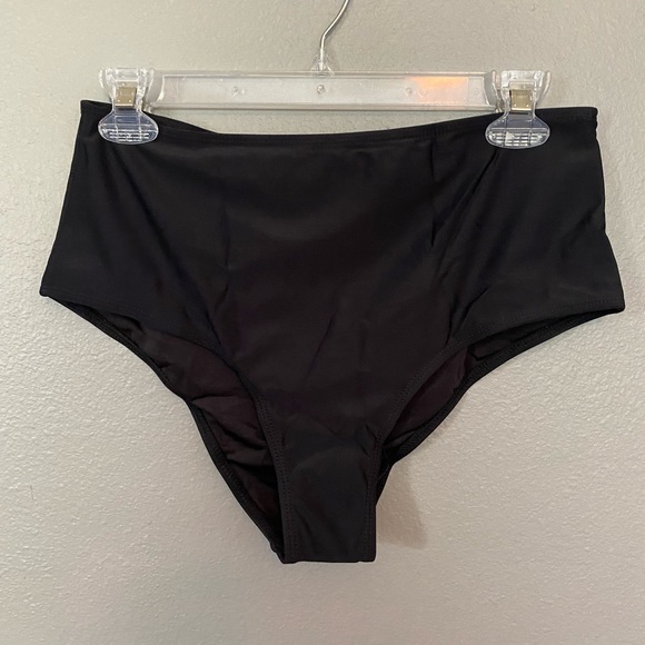 Swimsuit never worn. - Picture 2 of 2